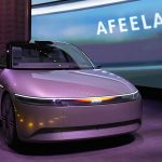 The electric vehicle prototype car Afeela, a joint venture between Sony and Honda, is displayed during a Sony news conference before the start of the CES tech show Wednesday, Jan. 4, 2023, in Las Vegas. (AP Photo/John Locher)